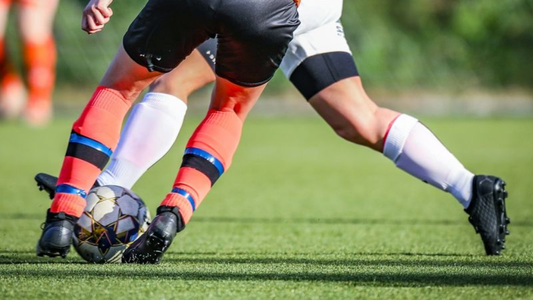 How to Wear Grip Socks and Sleeves (The Correct Way for Football)