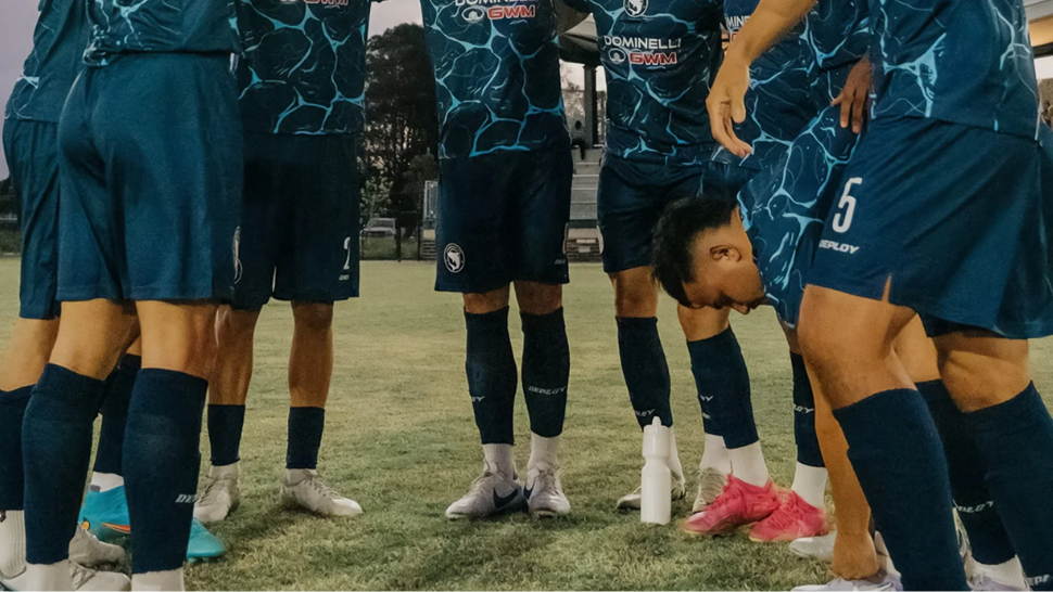 How to Wear Grip Socks with Team Socks (Complete Football Guide)