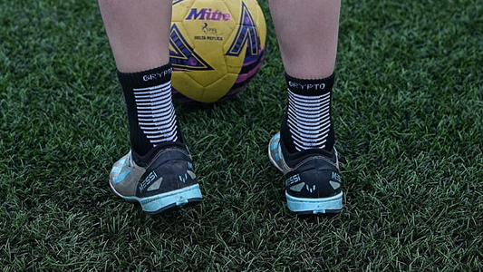 How to Wear Grip Socks with Football Boots (Complete Performance Guide)